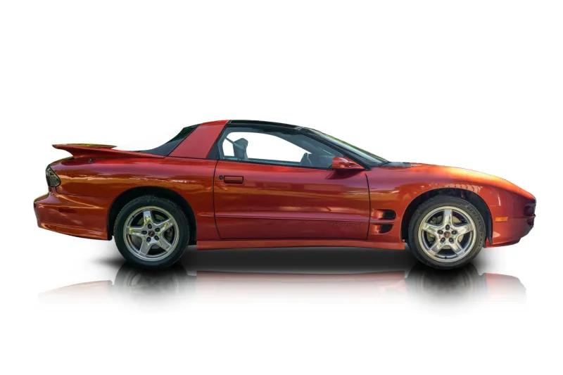 An incredible side shot photo of aPontiac Firebird that you should buy.