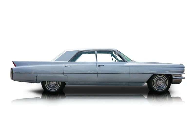 An incredible side shot photo of aCadillac DeVille that you should buy.