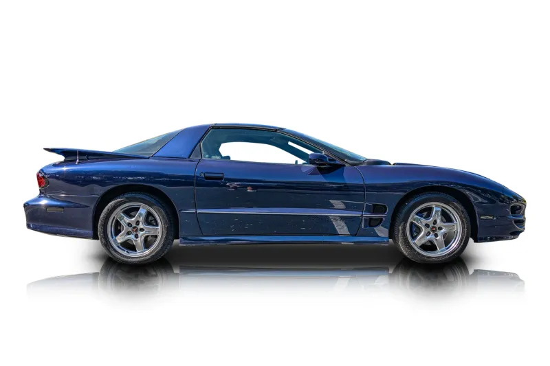 An incredible side shot photo of aPontiac Firebird that you should buy.