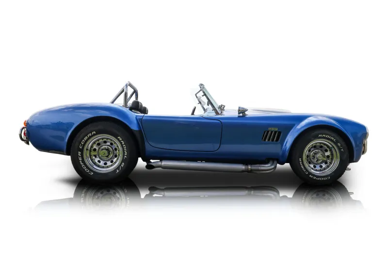 An incredible side shot photo of aShelby Cobra that you should buy.