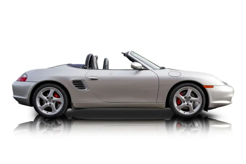 An incredible side shot photo of aPorsche Boxster that you should buy.