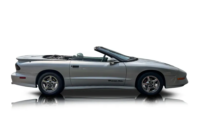 An incredible side shot photo of aPontiac Firebird that you should buy.