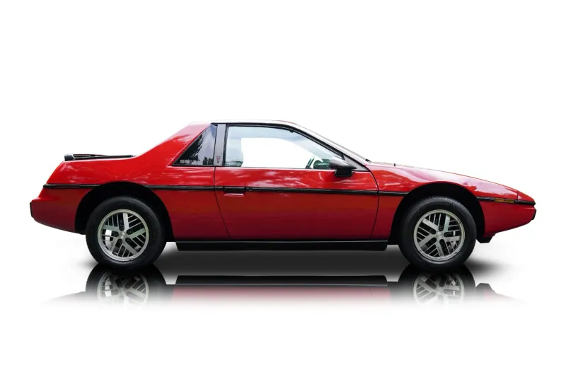 An incredible side shot photo of aPontiac Fiero that you should buy.