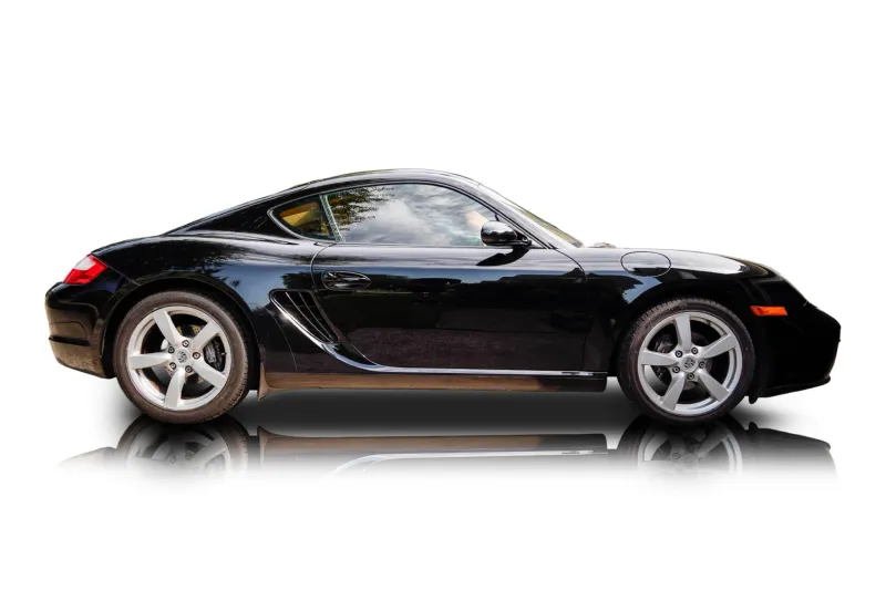 An incredible side shot photo of aPorsche Cayman that you should buy.
