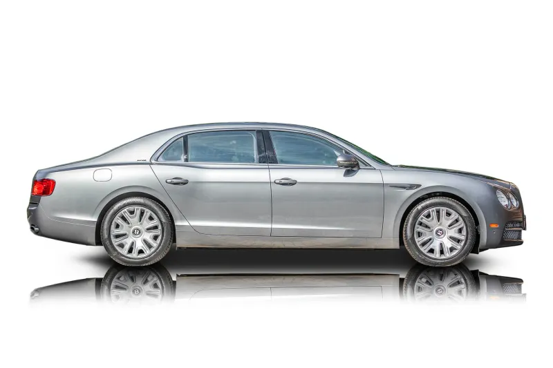 An incredible side shot photo of aBentley Flying Spur that you should buy.