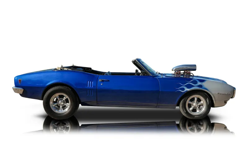 An incredible side shot photo of aPontiac Firebird that you should buy.
