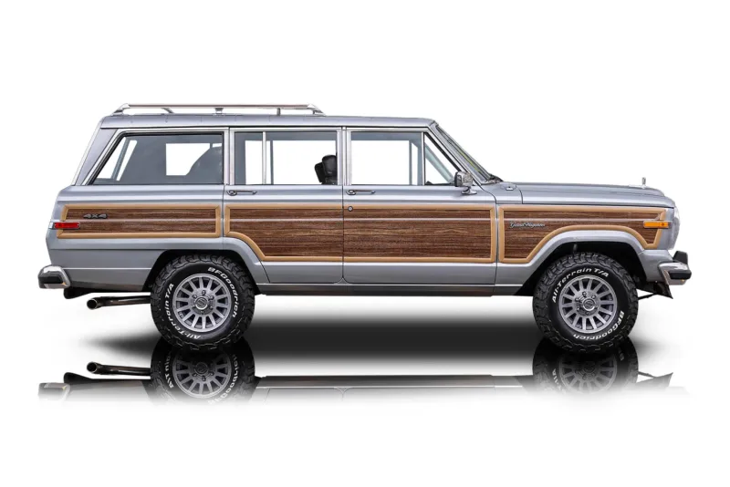 An incredible side shot photo of aJeep Grand Wagoneer that you should buy.