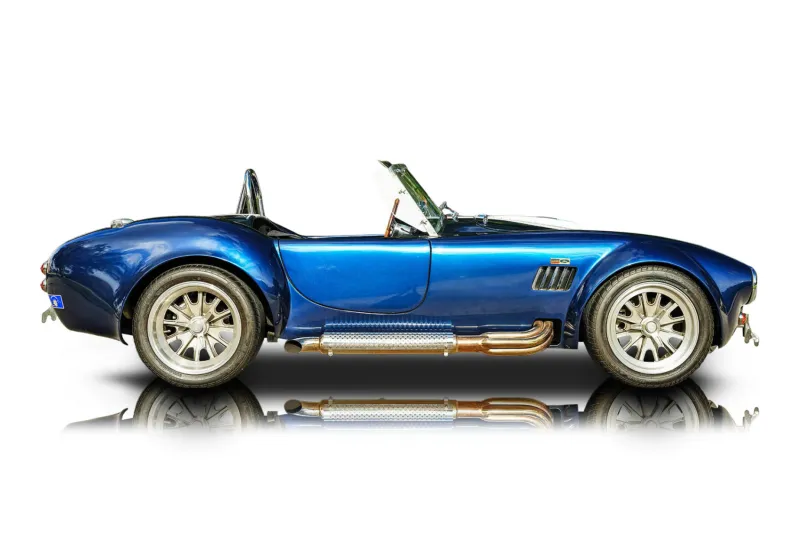 An incredible side shot photo of aShelby Cobra that you should buy.