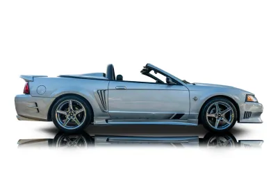 Passenger side photo of 1999 Ford Mustang
