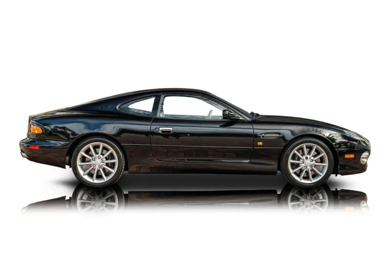 An incredible side shot photo of aAston Martin DB7 that you should buy.