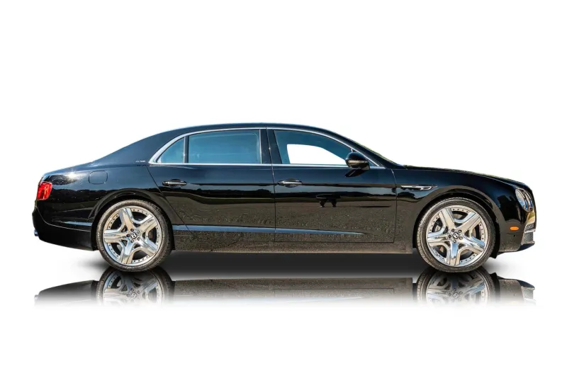 An incredible side shot photo of aBentley Flying Spur that you should buy.