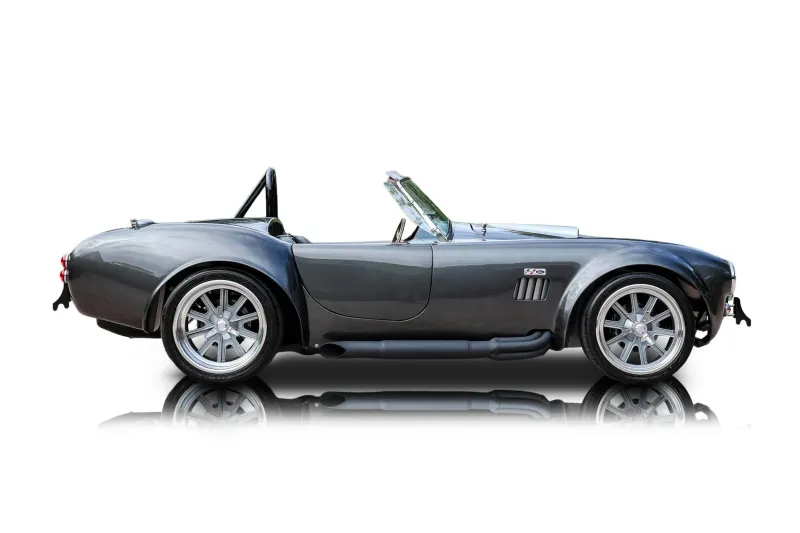 An incredible side shot photo of aShelby Cobra that you should buy.
