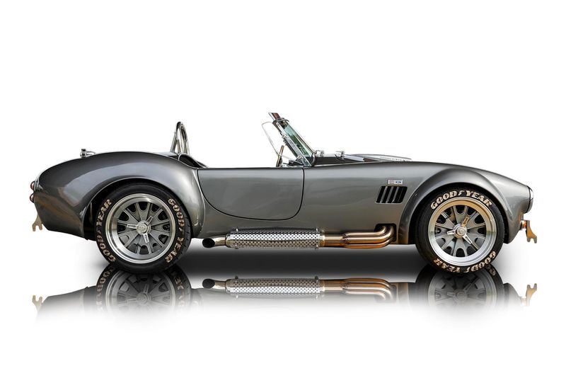 An incredible side shot photo of aShelby Cobra that you should buy.