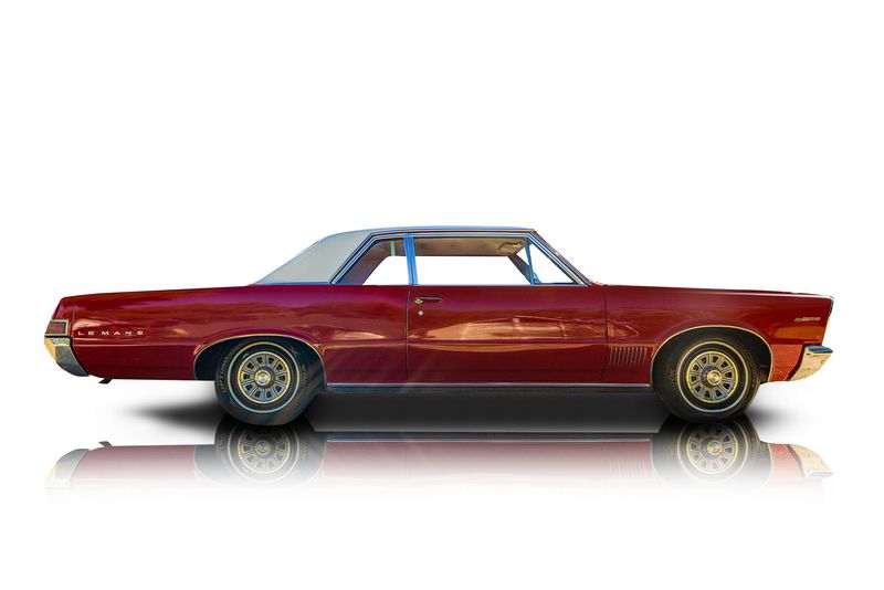 An incredible side shot photo of aPontiac LeMans that you should buy.