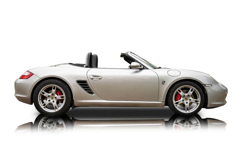 An incredible side shot photo of aPorsche Boxster that you should buy.