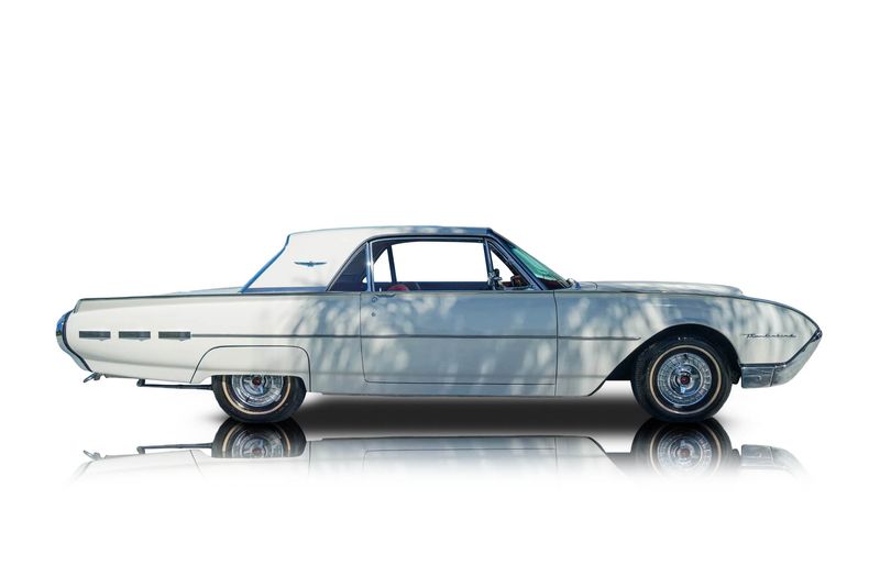 An incredible side shot photo of aFord Thunderbird that you should buy.
