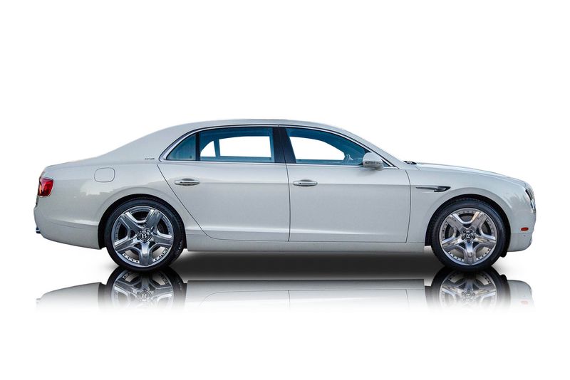 An incredible side shot photo of aBentley Flying Spur that you should buy.
