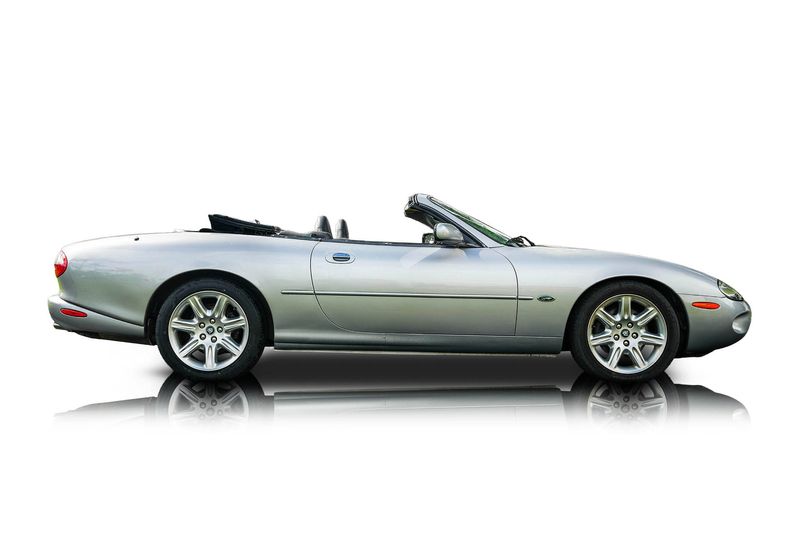 An incredible side shot photo of aJaguar XK8 that you should buy.